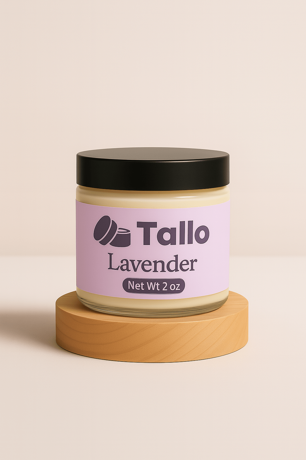2 oz. jar of Tallo Lavender whipped grass fed beef tallow balm on block
