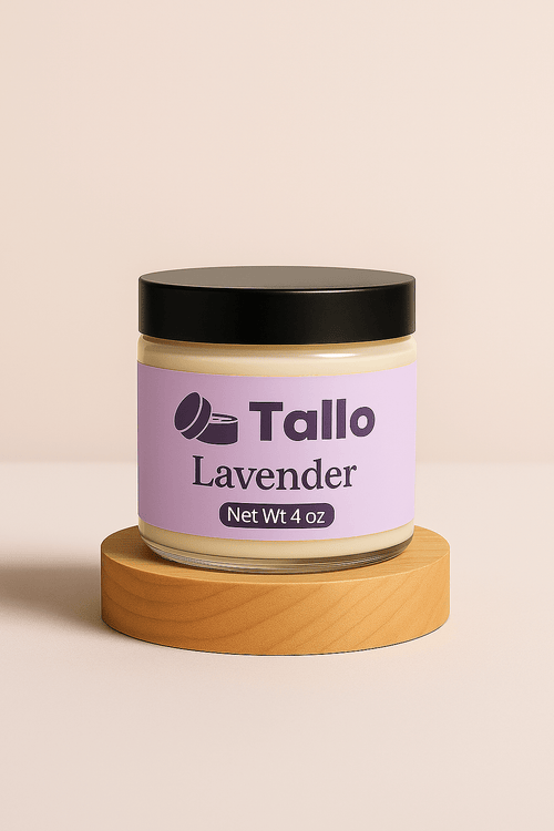 4 oz jar of Tallo Lavender whipped grass fed beef tallow balm on wood block